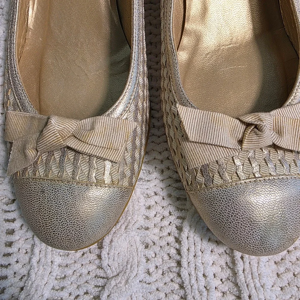 Stuart Weitzman models metallic detail